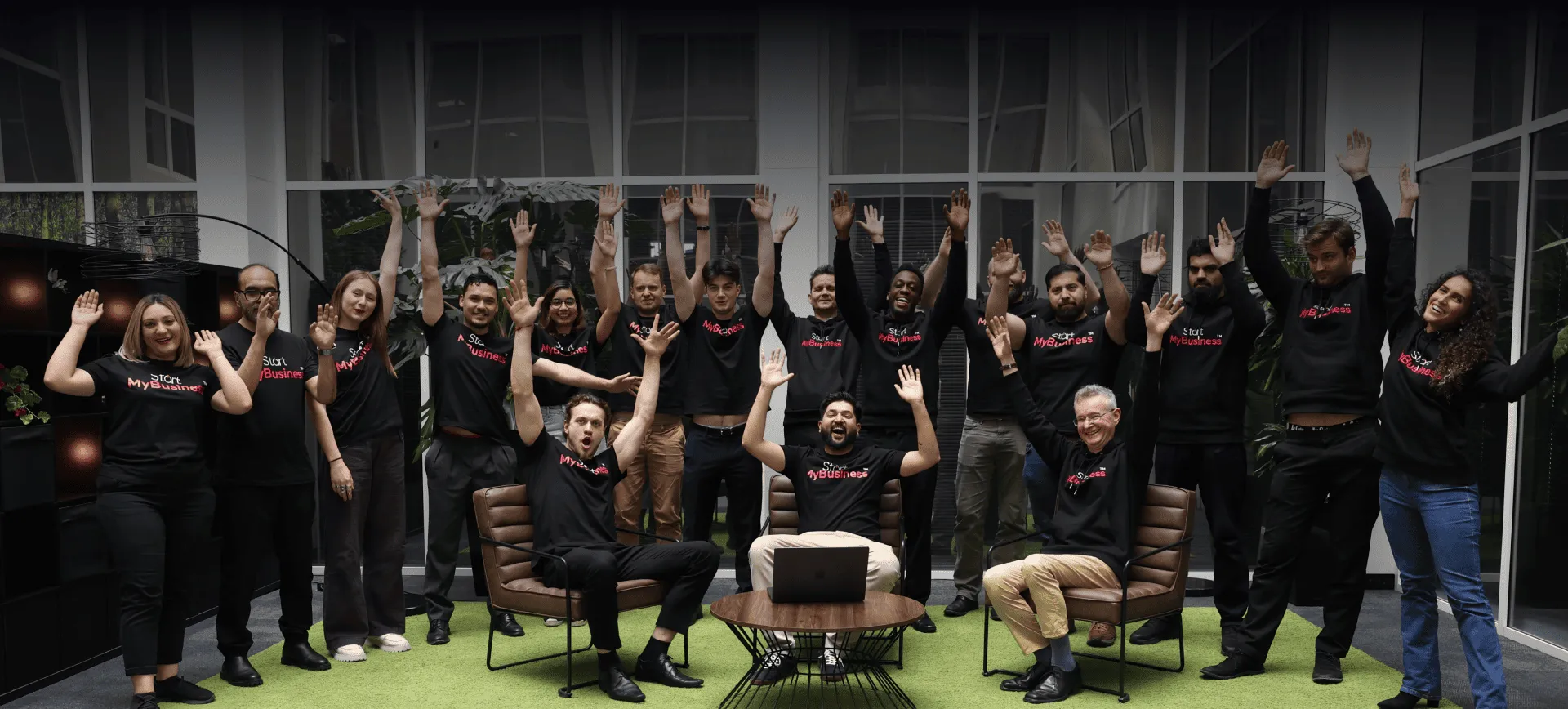 Happy founders raising hands illustration